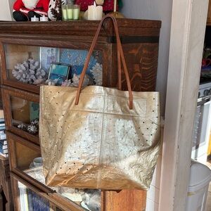 Linde Gallery St. Barth. Gold Gouverneur Perforated Ultralight Bag. Large.